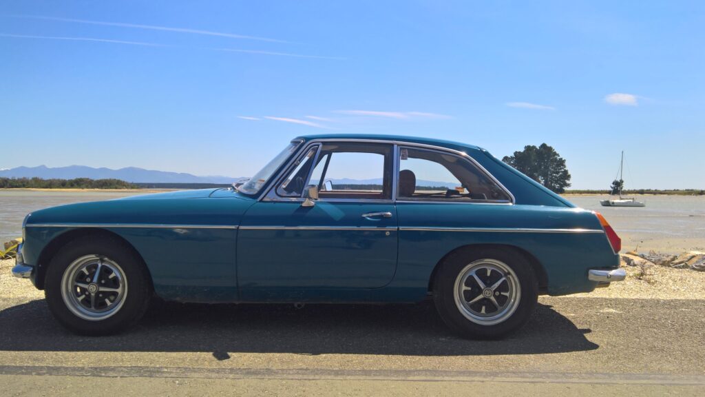 1972 MG BGT side on beside the seaside beside the sea