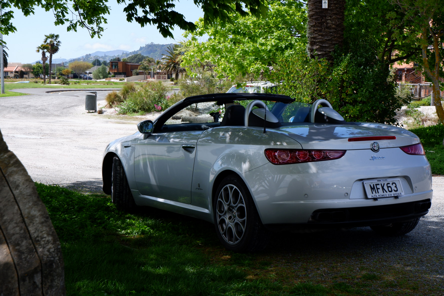 2009 Spider Monaco roof down under tree side